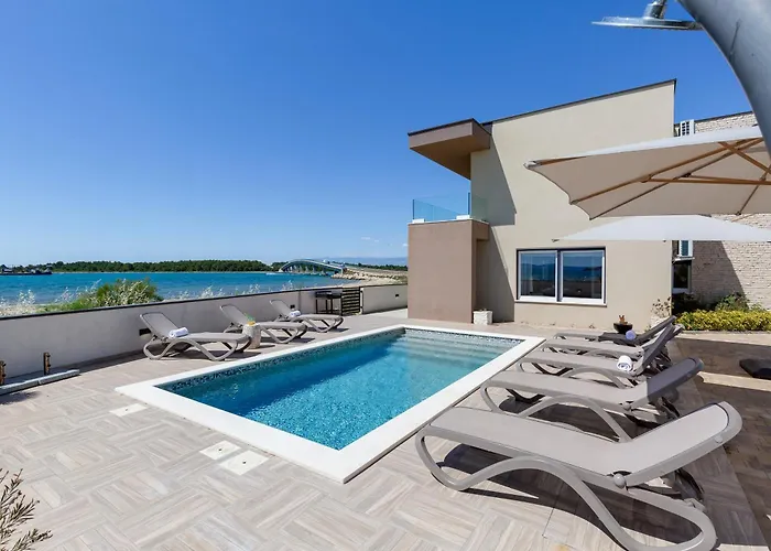 Villa Sea Gem - Beachfront With Heated Pool,